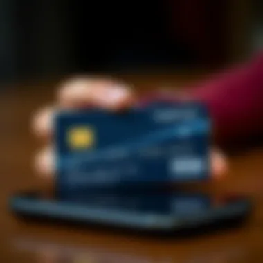Credit Card and Smartphone Credit card and smartphone indicating balance inquiry